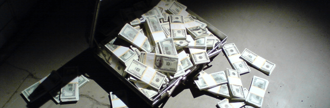 an image of a brief case that has been opened and piles of hundred dollar bills are spilling out of it onto the ground