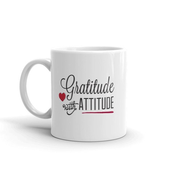 white coffee mug with the text Gratitude with Attitude