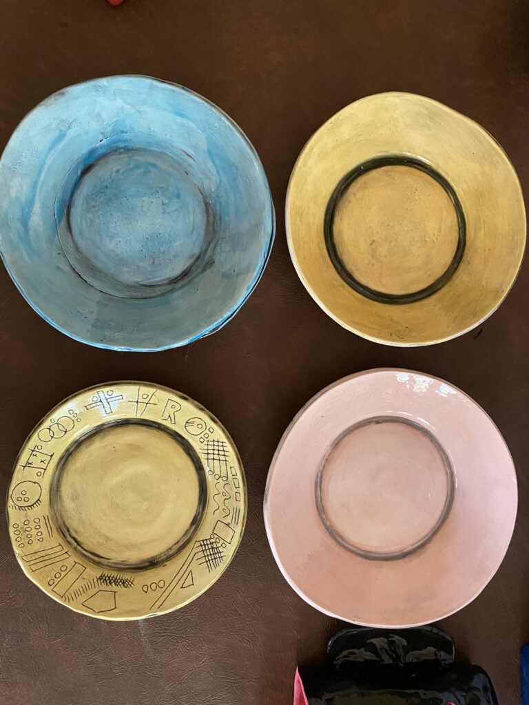 Hand Made Four Ceramic Bowls On Top Of Table Created By Tina Reynolds