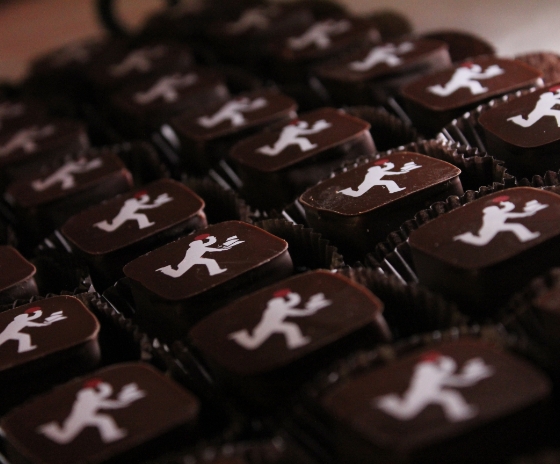 Fudge candies with the uptown studios logo