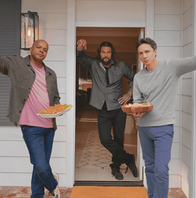 Donald Faison, Zac Braff, & some guy with long hair standing on the porch